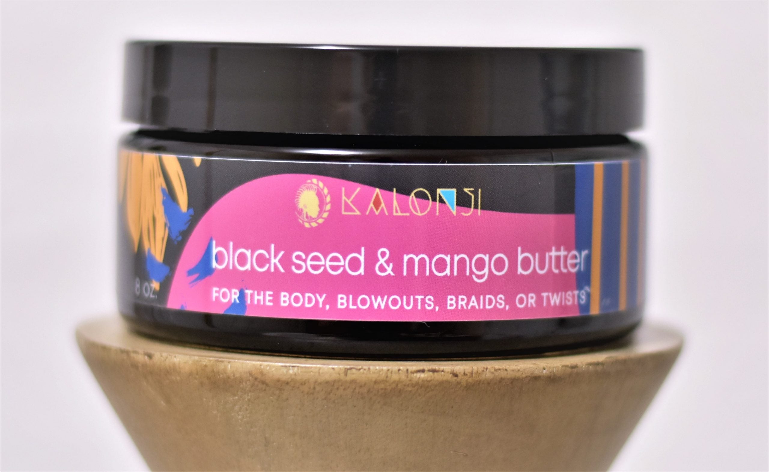 black seed and mango butter container front